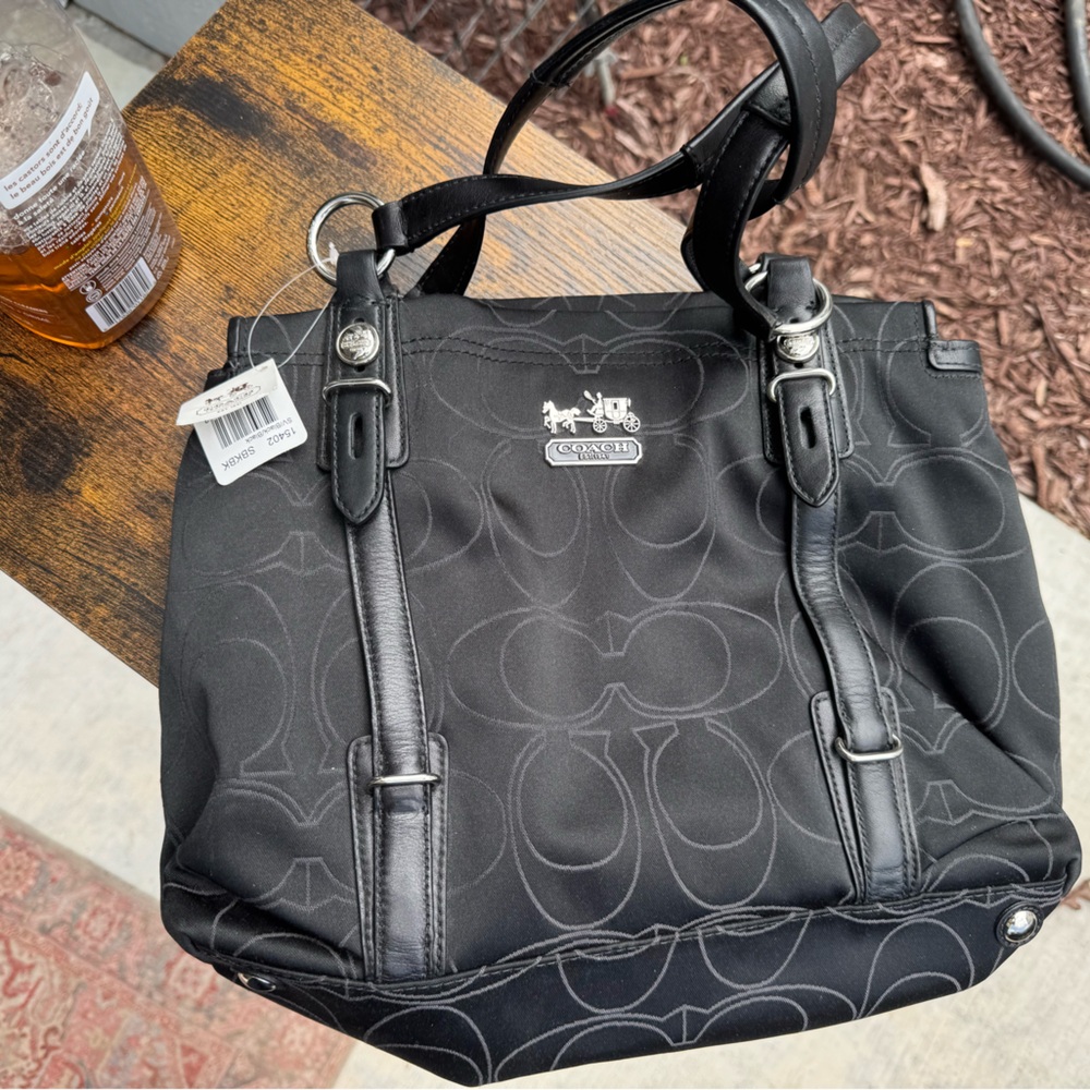 Coach Black Mini Bag with Signature Design